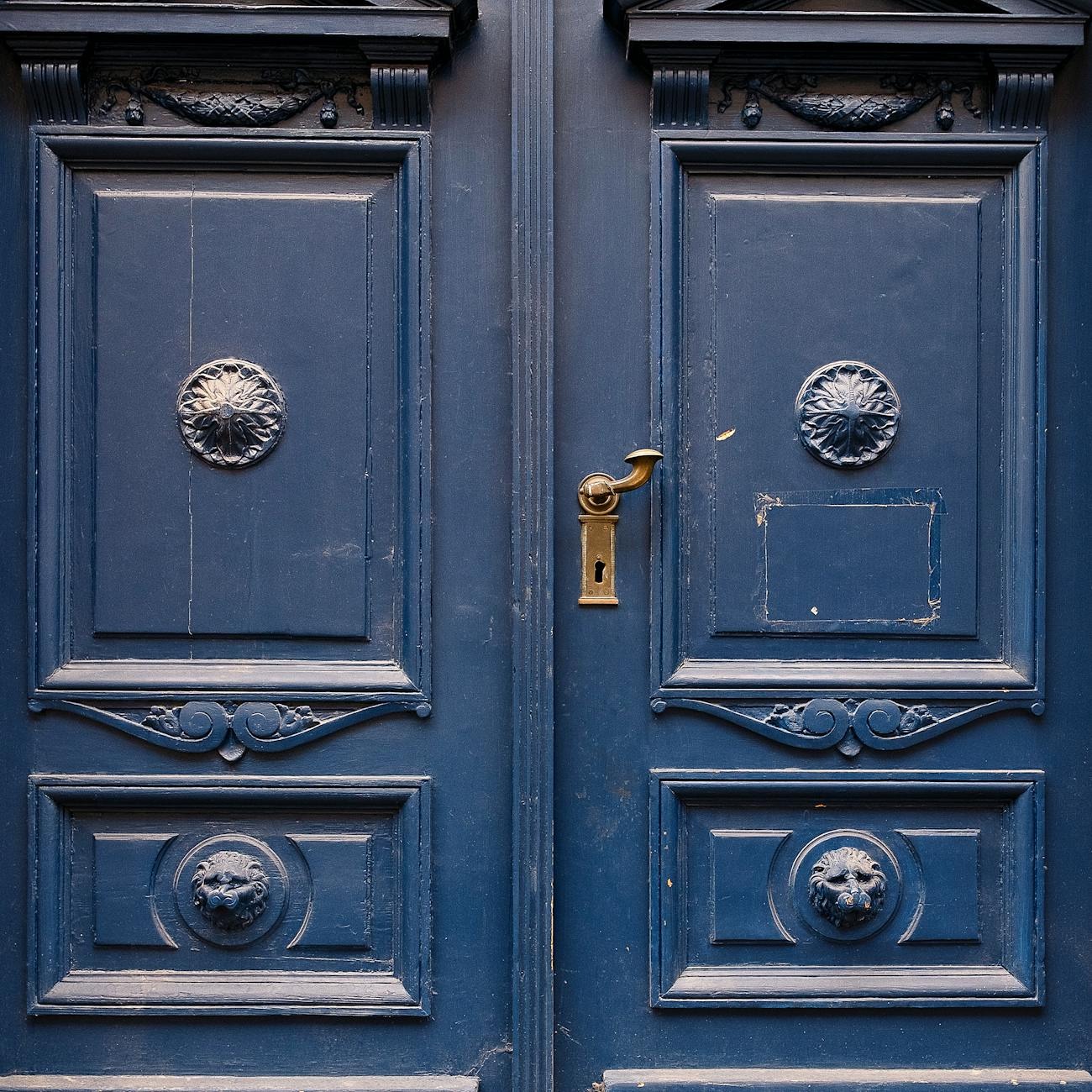 Initial assessment of door hardware and carved wood panels